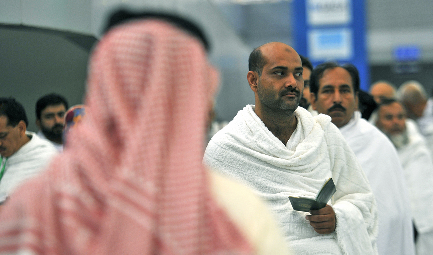 Pakistani Muslims wait to be checked by security as the first pilgrims for the annual Hajj pilgrimage arrive in Jeddah, Saudi Arabia on July 24, 2017. (AFP/File)