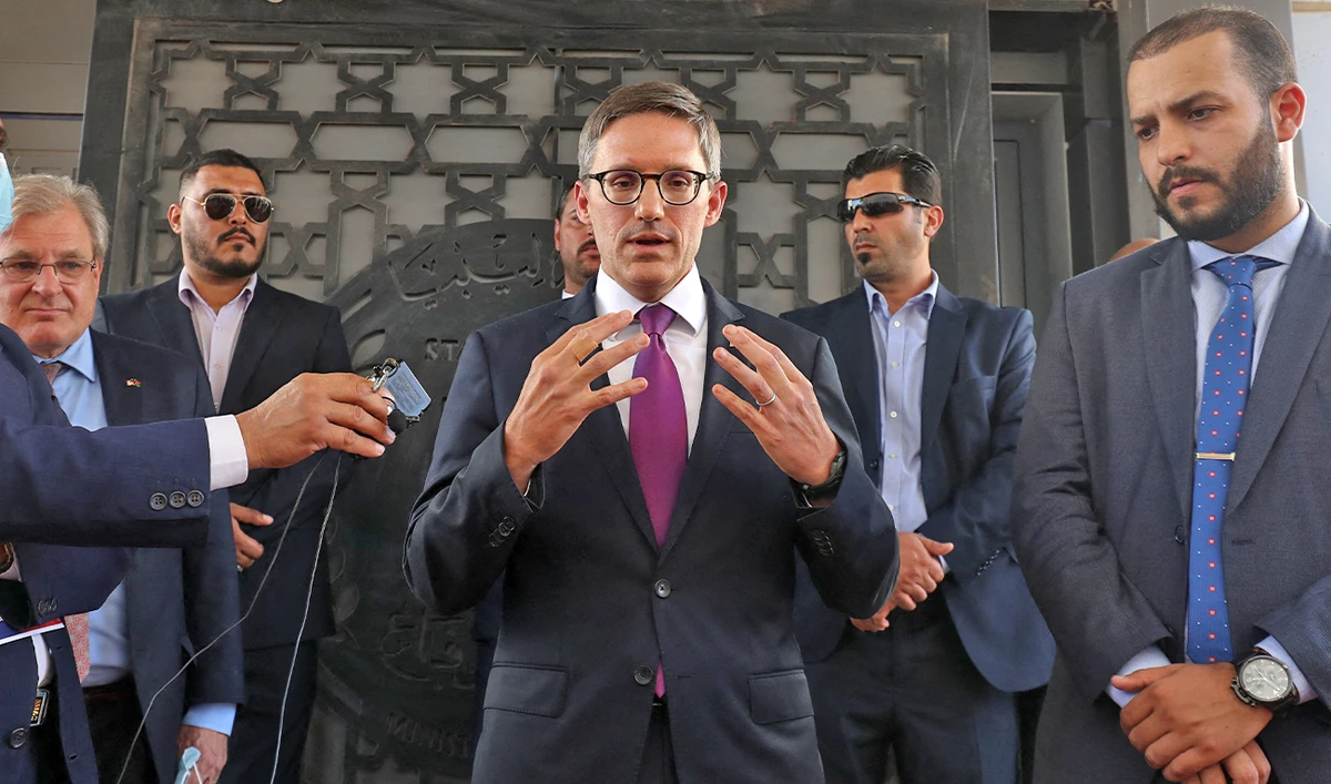 US envoy Derek Chollet (C) speaks to the media in the capital Tripoli, Libiya, on September 15, 2021. (AFP/File)