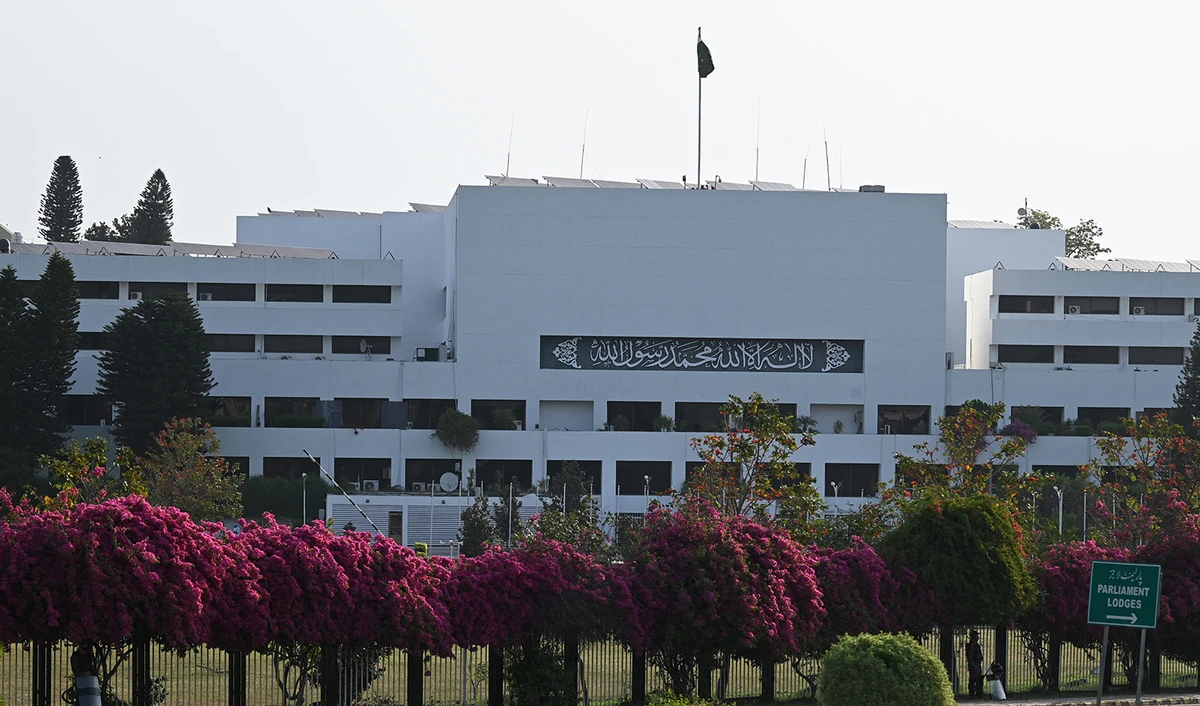 Security personnel patrol outside the Parliament House building in Islamabad, Pakistan, on April 9, 2022. (AFP/File)