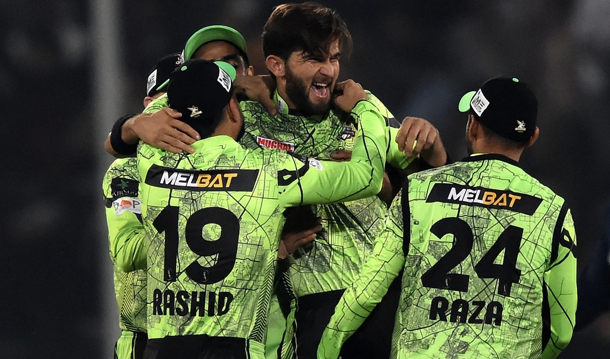 Lahore Qalandars' celebrate the wicket of Peshawar Zalmi's Mohammad Haris (2ndL) during the Pakistan Super League (PSL) T20 cricket match between Lahore Qalandars and Peshawar Zalmi at the Gaddafi Cricket Stadium in Lahore on February 26, 2023. (Photo courtesy: AFP)