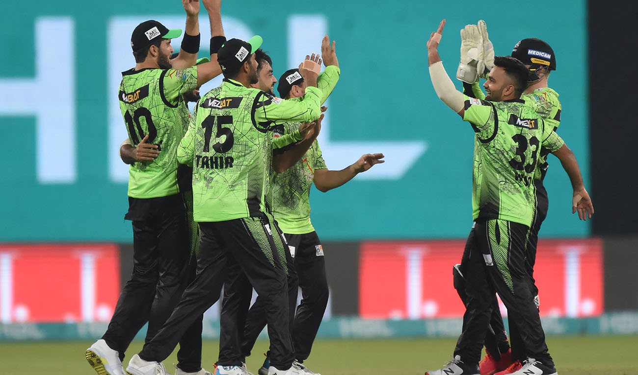 Lahore Qalandars' cricketers celebrate after the dismissal of Quetta Gladiators' Iftikhar Ahmed (not pictured) during the Pakistan Super League (PSL) T20 cricket match between Lahore Qalandars and Quetta Gladiators at the Gaddafi Cricket Stadium in Lahore on March 2, 2023. (AFP)