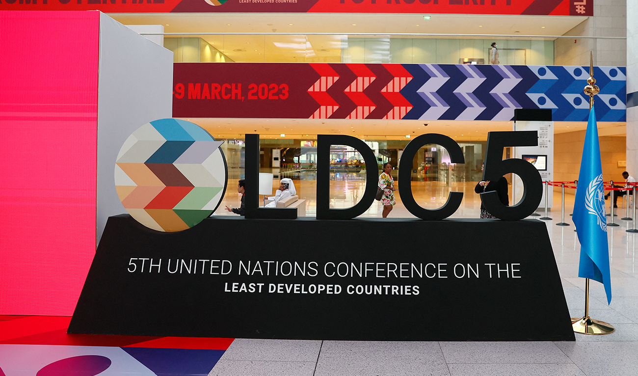 The LDC5 logo is set up during preparations for the 5th United Nations Conference on the Least Developed Countries (LDC5) at Qatar National Convention Centre (QNCC) in Doha on March 3, 2023. (AFP)