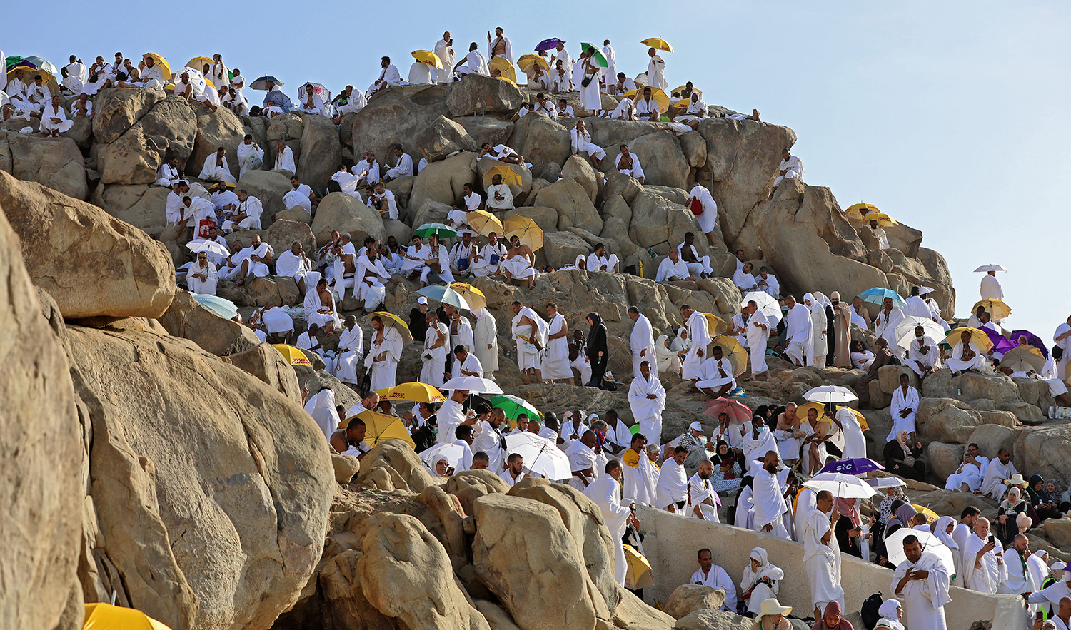 Muslim pilgrims gather atop Mount Arafat, also known as Jabal al-Rahma (Mount of Mercy), southeast of Makkah, Saudi Arabia, during the climax of the Hajj pilgrimage, on July 8, 2022. (APF/File)