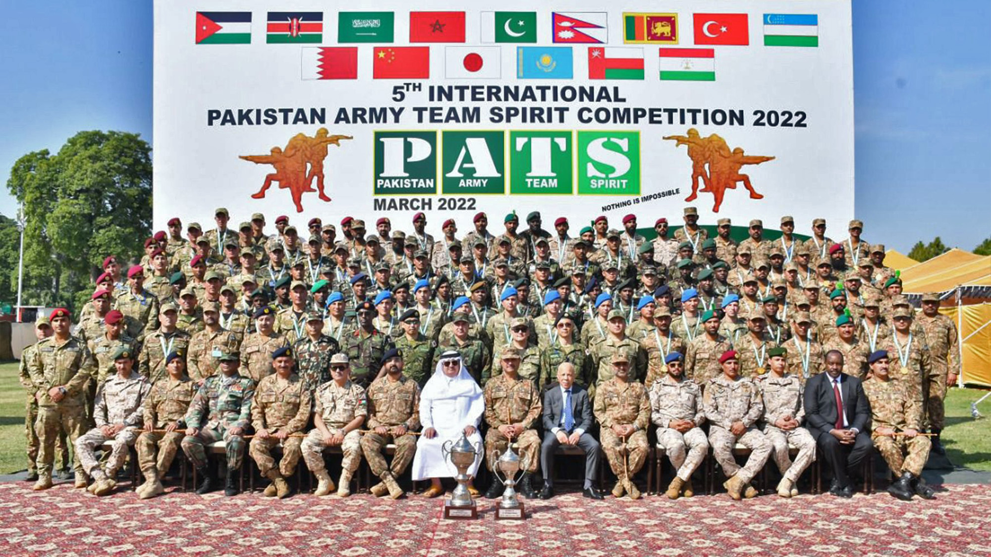 A group photo of teams participating in fifth international Pakistan Army Team Spirit (PATS) Competition-2022 in Pabbi, Pakistan on Mar 12, 2022. (ISPR)