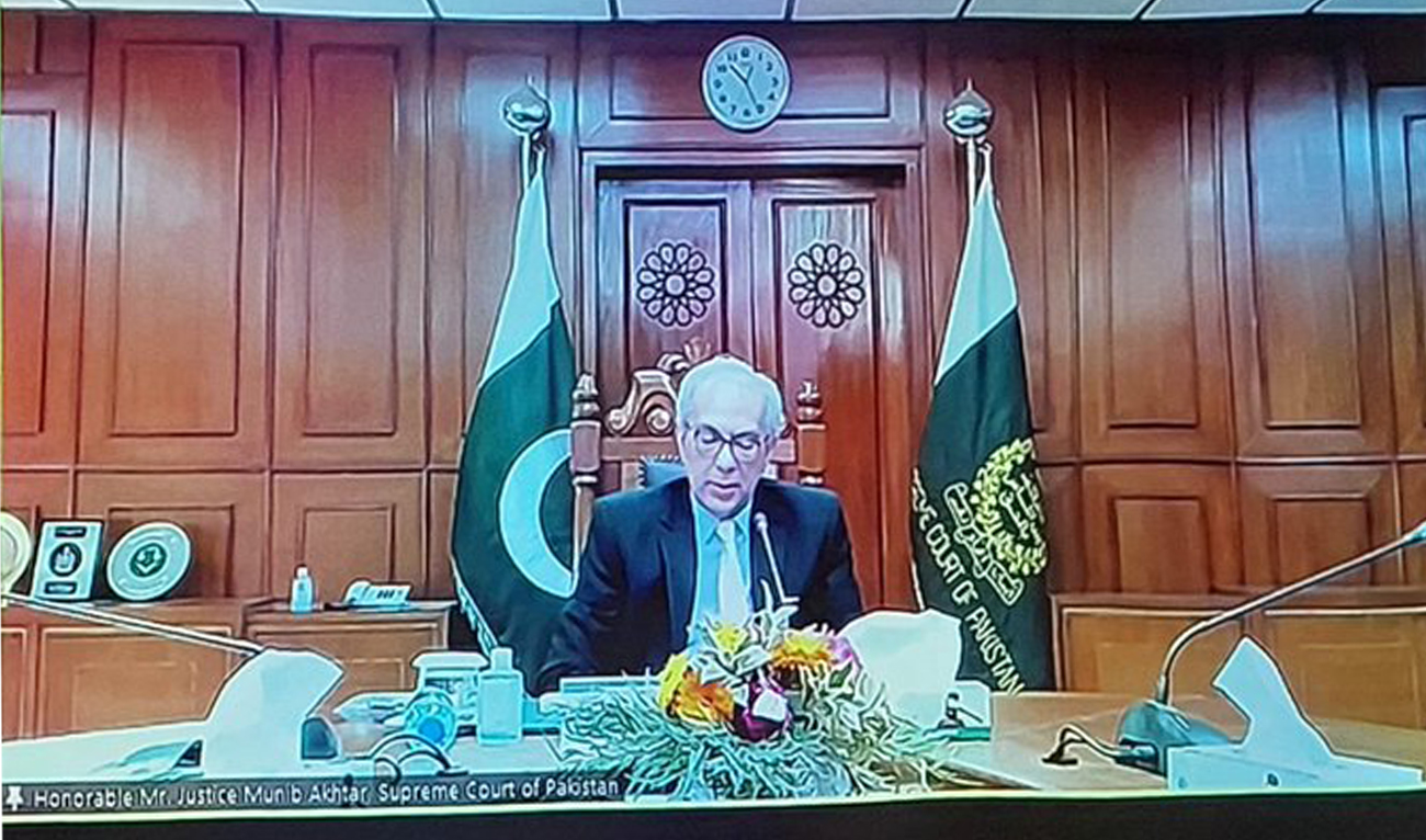 Pakistan's supreme court judge, Justice Munib Akhtar, virtually addresses a meeting of chief justices of the Shanghai Cooperation Organization (SCO) being held in New Delhi, India, on March 11, 2023. (@ForeignOfficePk/Twitter)