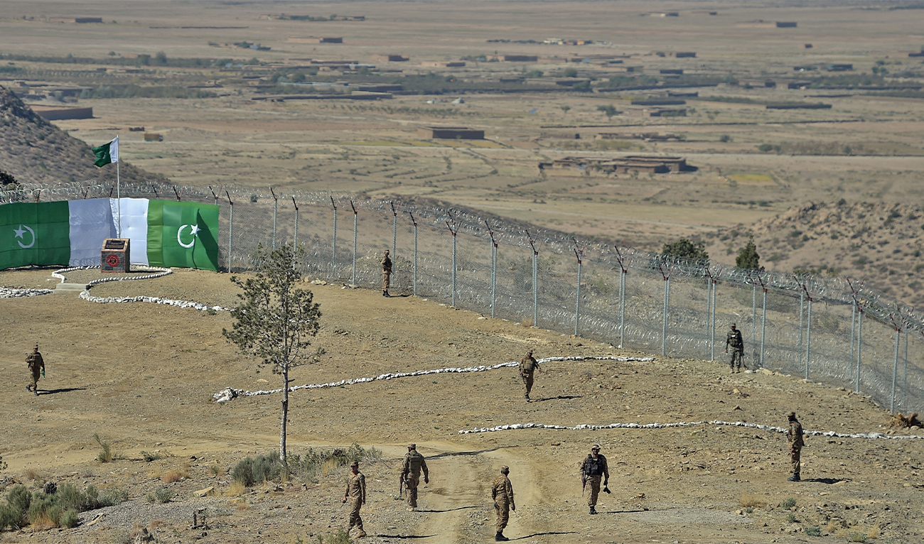 Pakistani soldiers patrol next to a newly fenced border fencing along with Afghan's Paktika province border in Angoor Adda in Pakistan's South Waziristan tribal agency on October 18, 2017. (AFP/File)