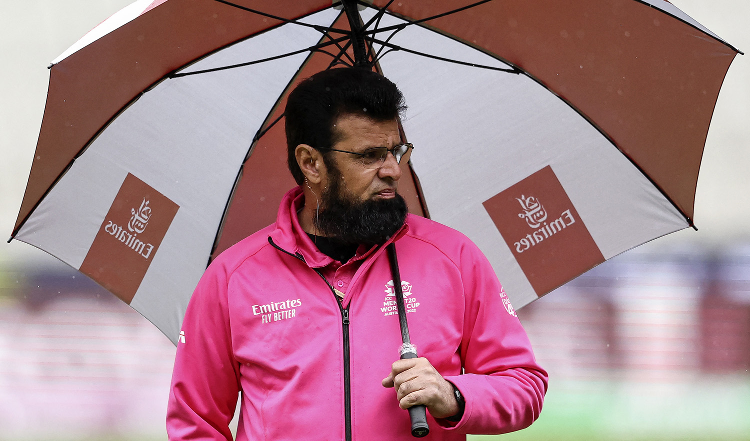 Umpire Aleem Dar examines the outfield during the ICC men's Twenty20 World Cup 2022 cricket match between Afghanistan and Ireland at Melbourne Cricket Ground (MCG) in Melbourne on October 28, 2022. (AFP/File)