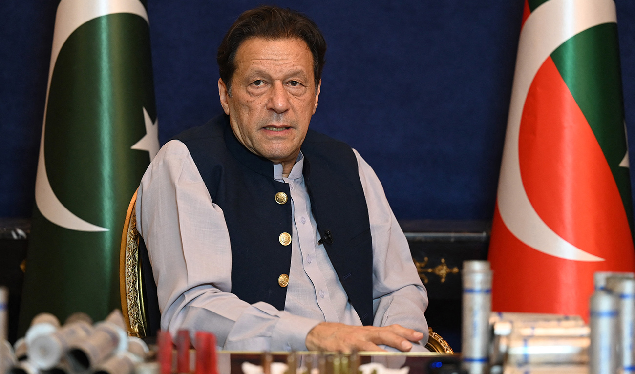 Former Pakistan's prime minister Imran Khan speaks during an interview with AFP at his residence in Lahore on March 15, 2023. Former Pakistan prime Minister Imran Khan on March 15 said the government wanted him behind bars in order to stop him taking part in elections due later this year. (AFP/FILE)