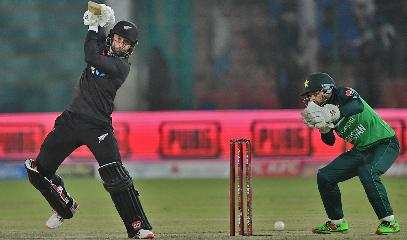 New Zealand's Devon Conway (L) plays a shot during the third and final one-day international (ODI) cricket match between Pakistan and New Zealand at the National Stadium, Pakistan, in Karachi on January 13, 2023. (AFP/File)