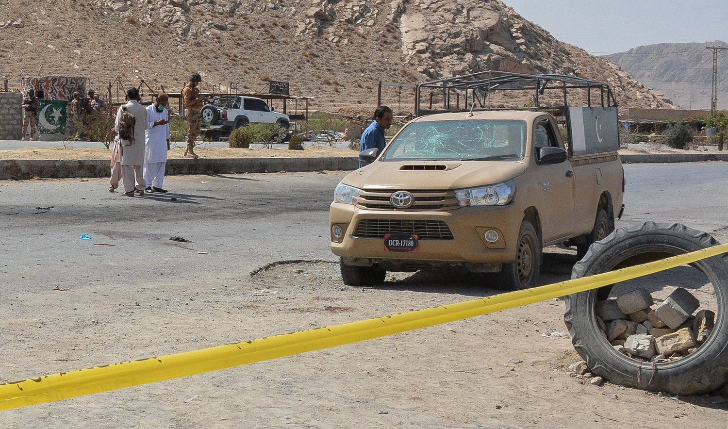 This representational photo shows security personnel examining the site of a blast after a suicide bomber on a motorbike blew himself up near a checkpoint in Pakistan's southwestern city of Quetta on September 5, 2021. (AFP/File)