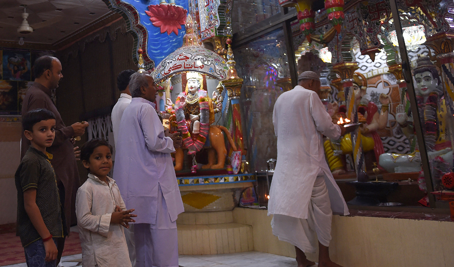 This representational photo shows Pakistani Hindus praying at the Shri Krishna Temple in Mithi, some 320 km from Karachi on May 24, 2018. (AFP/File)
