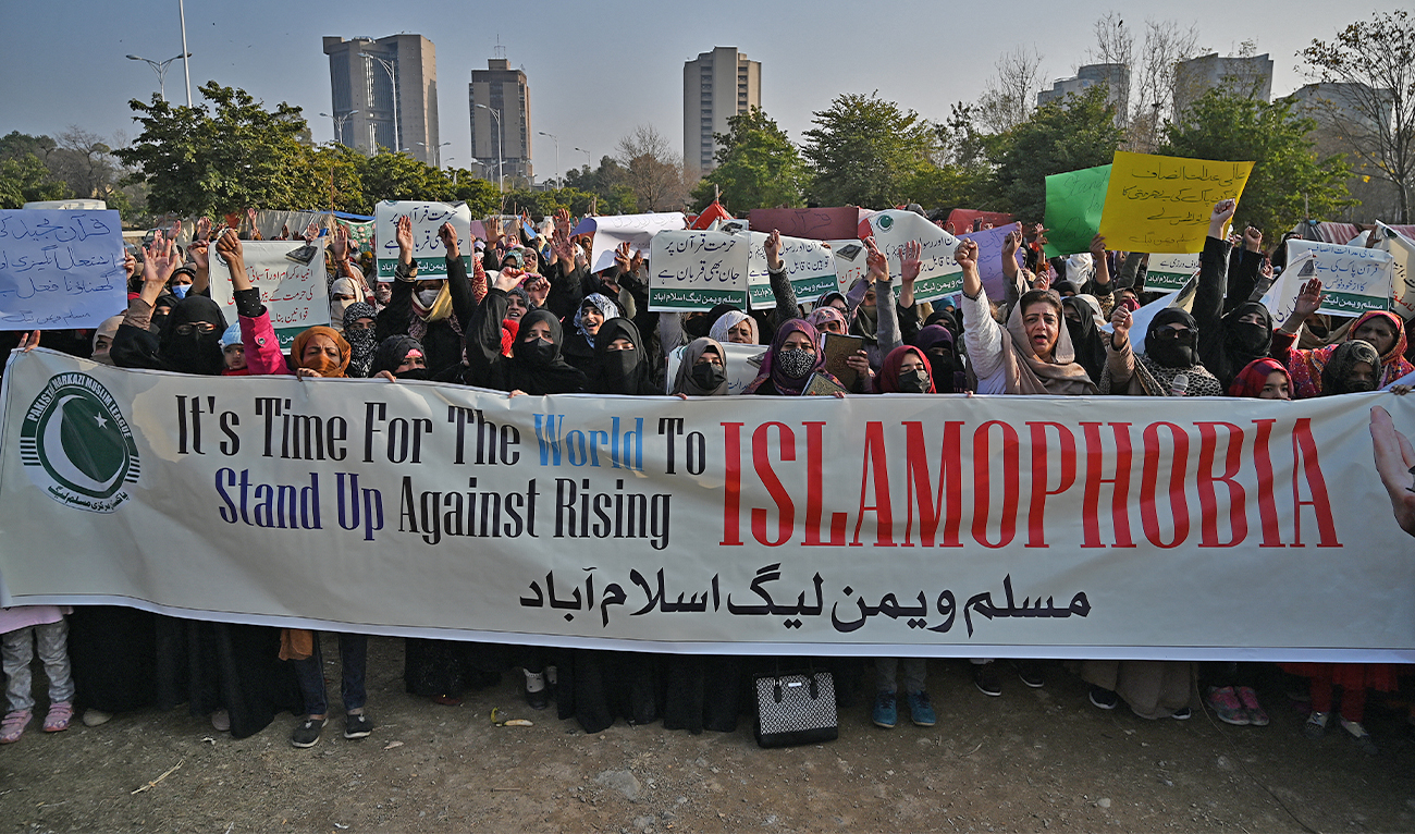 Activists of Muslim Women League take part in a protest in Islamabad on January 26, 2023, against the torching of the Qur’an in Sweden over the weekend. (AFP/File)