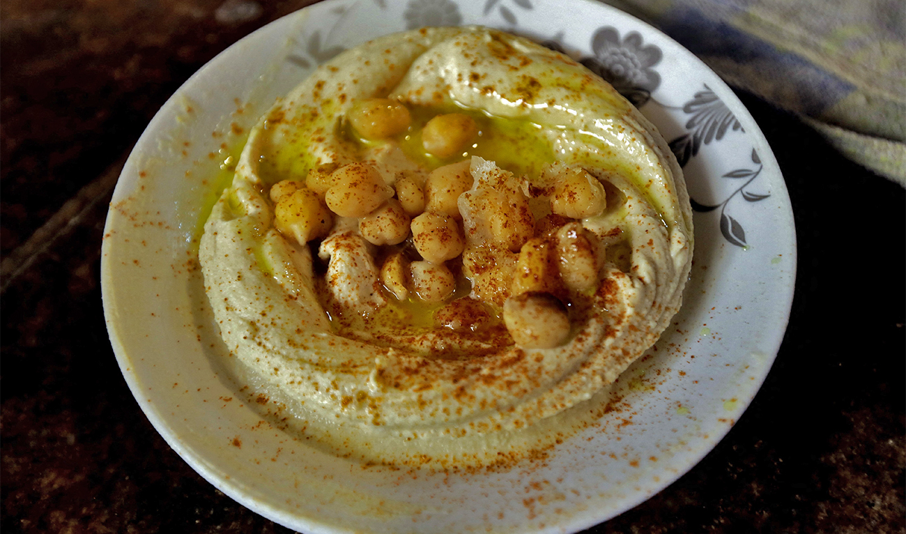 A plate of Hummus is served at a restaurant in the Lebanese coastal city of Tripoli, north of Beirut on October 20, 2014. (AFP.File)