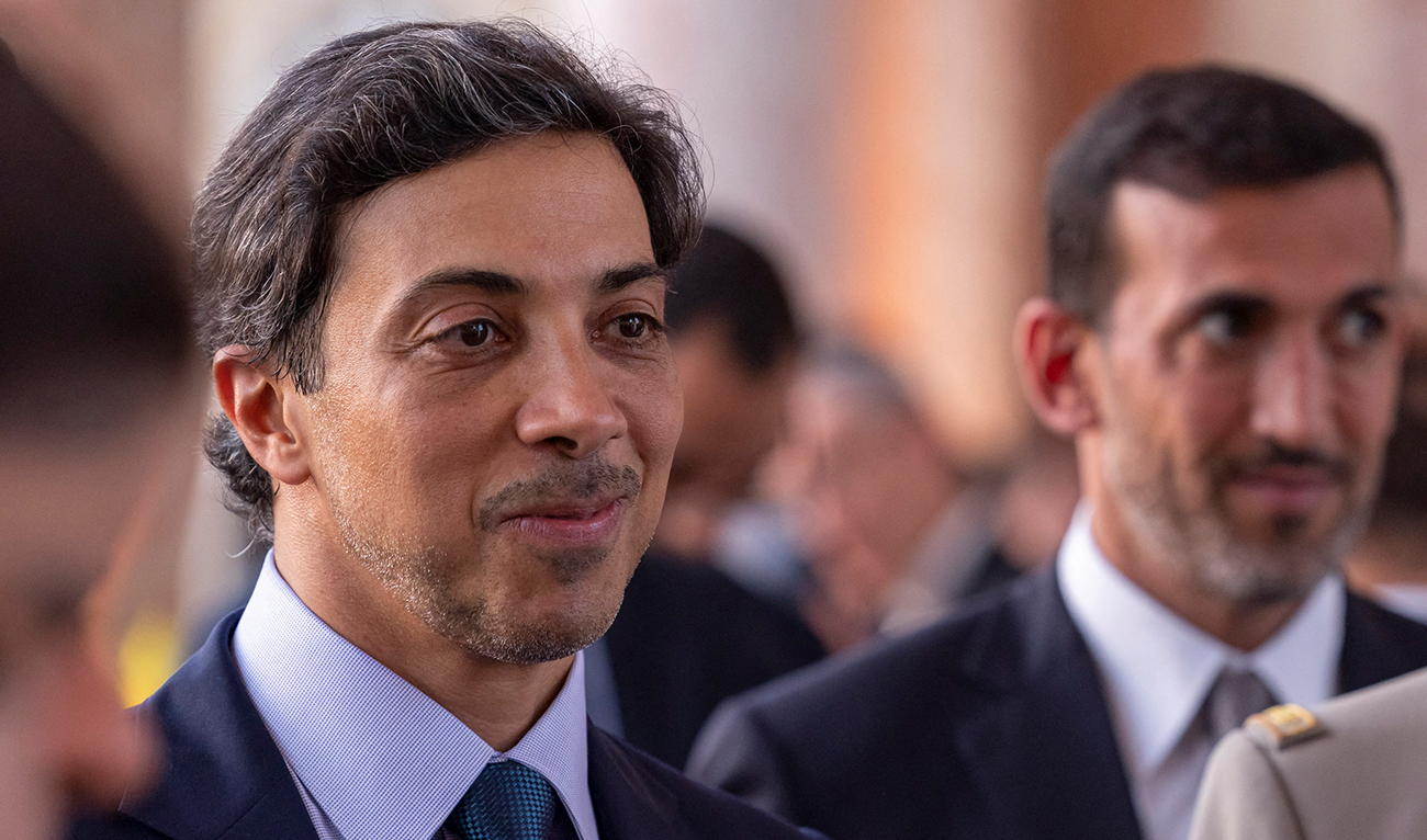 In this file handout image provided by the UAE Ministry Of Presidential Affairs on July 18, 2022, UAE's Deputy Prime Minister and Minister of the Presidential Court Mansour bin Zayed al-Nahyan (L) attends a reception dinner hosted by France's President Emmanuel Macron (not pictured) at the Grand Trianon in Versailles. Manchester City's owner Sheikh Mansour bin Zayed Al Nahyan was named as vice-president of the United Arab Emirates in a shake-up of the oil-rich Gulf monarchy's top ranks on March 29, 2023. (Photo courtesy: Ministry of Presidential Affairs - Abu Dhabi / AFP)