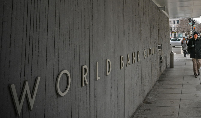 A person walks by the building of the Washington-based global development lender, The World Bank Group, in Washington DC, US on January 17, 2019. (AFP/File)