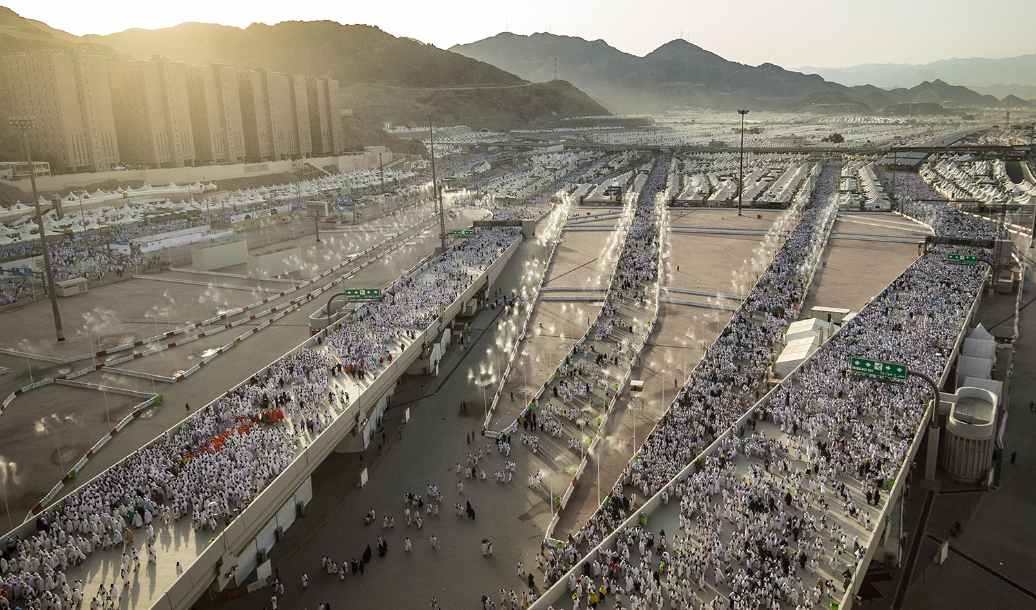 Thousands of Muslim pilgrims make their way across the valley of Mina near Makkah, Saudi Arabia to perform the "stoning of the devil" ritual during Hajj pilgrimage on July 9, 2022. (AFP/File)