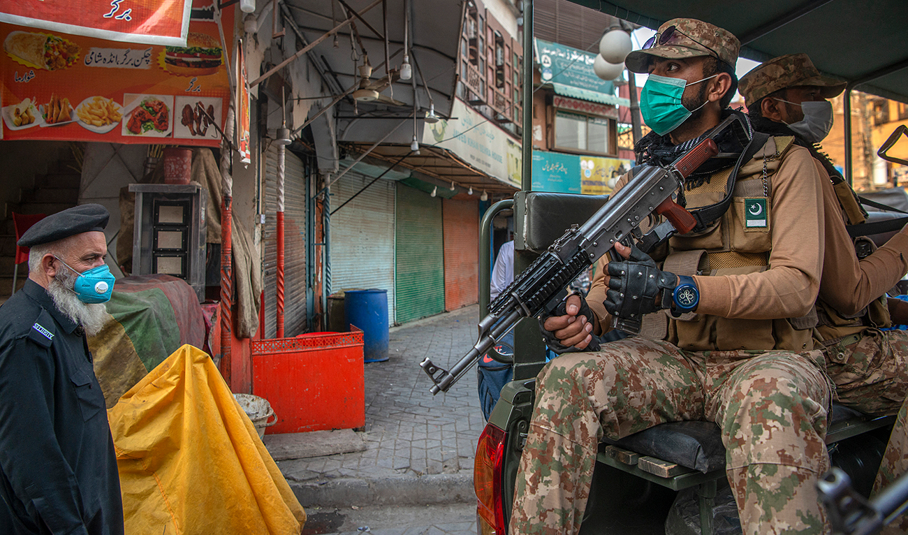 This file photo, taken on April 26, 2021, shows army soldiers patrolling in Peshawar market. (Photo courtesy: AFP/File)