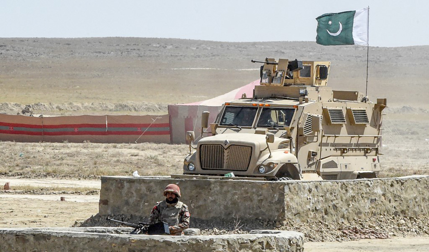 Security personnel of Pakistan's Frontier Corps stand guard in a bunker near Badini Trade Terminal Gateway at the Pakistan's border town of Qila Saifullah in the southwestern province of Balochistan on September 16, 2020. (AFP/File)
