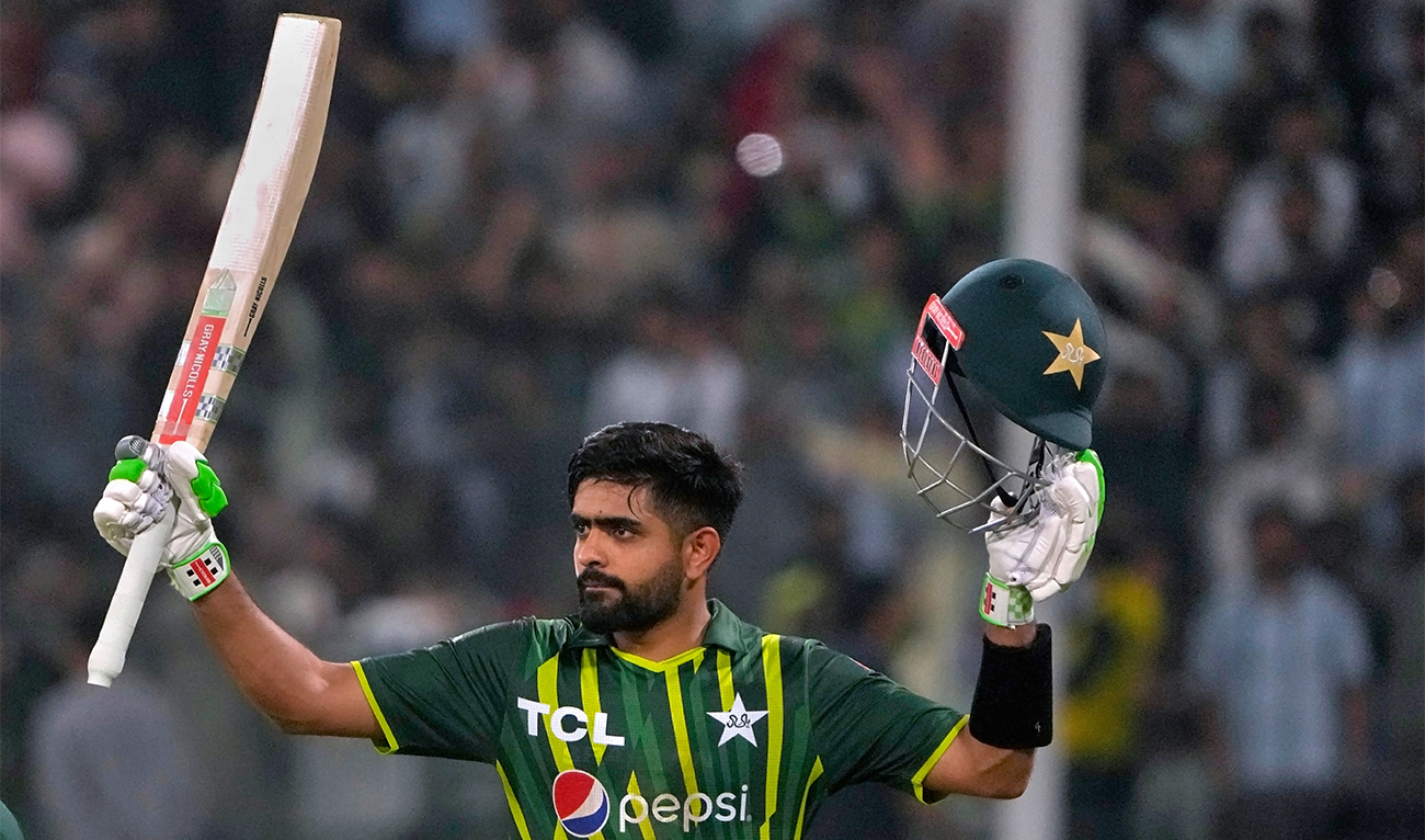 Pakistan's Babar Azam is acknowledged by crowd after his century as he walks off the field during the second twenty20 cricket match between Pakistan and New Zealand, in Lahore, Pakistan, on April 15, 2023. (AP)