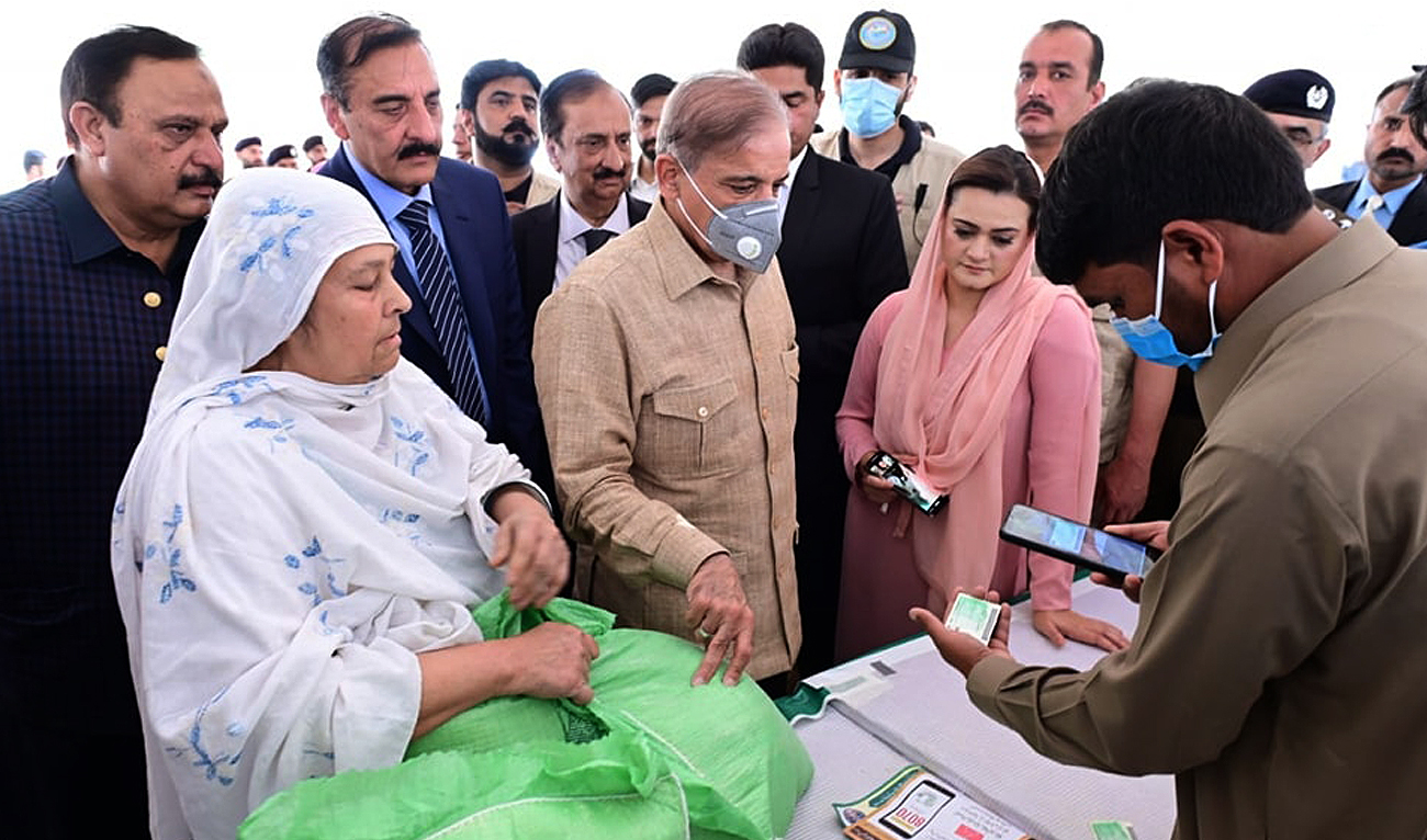 In this picture, taken on March 27, 2023, Prime Minister Shehbaz Sharif visits sugar distribution points, established in connection with the Ramadan relief package, in Rawalpindi. (Photo courtesy: PID)