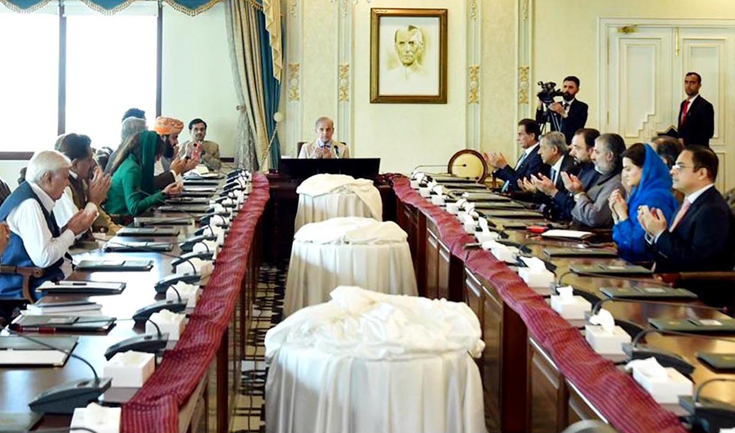 Pakistan Prime Minister Shehbaz Sharif, center, chairs meeting of the leaders of coalition parties in Islamabad on April 18, 2023. (PID)