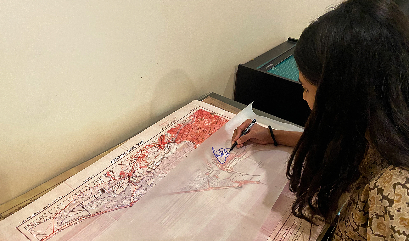 This picture, taken on April 14, 2023, shows a Pakistani urban designer, Namra Khalid, making a map of Karachi’s evolution and its climate impacts in Karachi. (AN Photo)