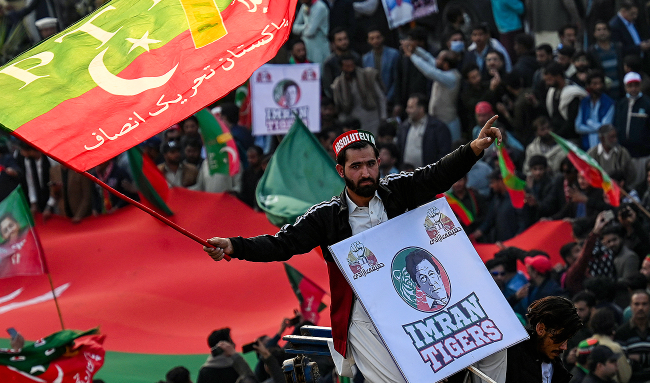 In this file picture, taken on November 26, 2022m supporters of Pakistan's former Prime Minister Imran Khan attend an anti-government rally in Rawalpindi. (Photo courtesy: AFP/File)