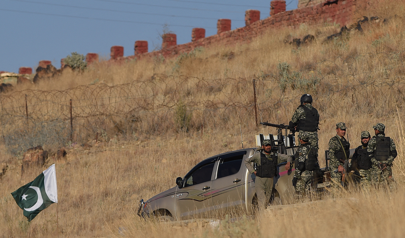 In this file photo, taken on January 27, 2019, Pakistani army soldiers gather near a vehicle at a border terminal in Ghulam Khan, a town in North Waziristan, on the border between Pakistan and Afghanistan. (Photo courtesy: AFP/File)