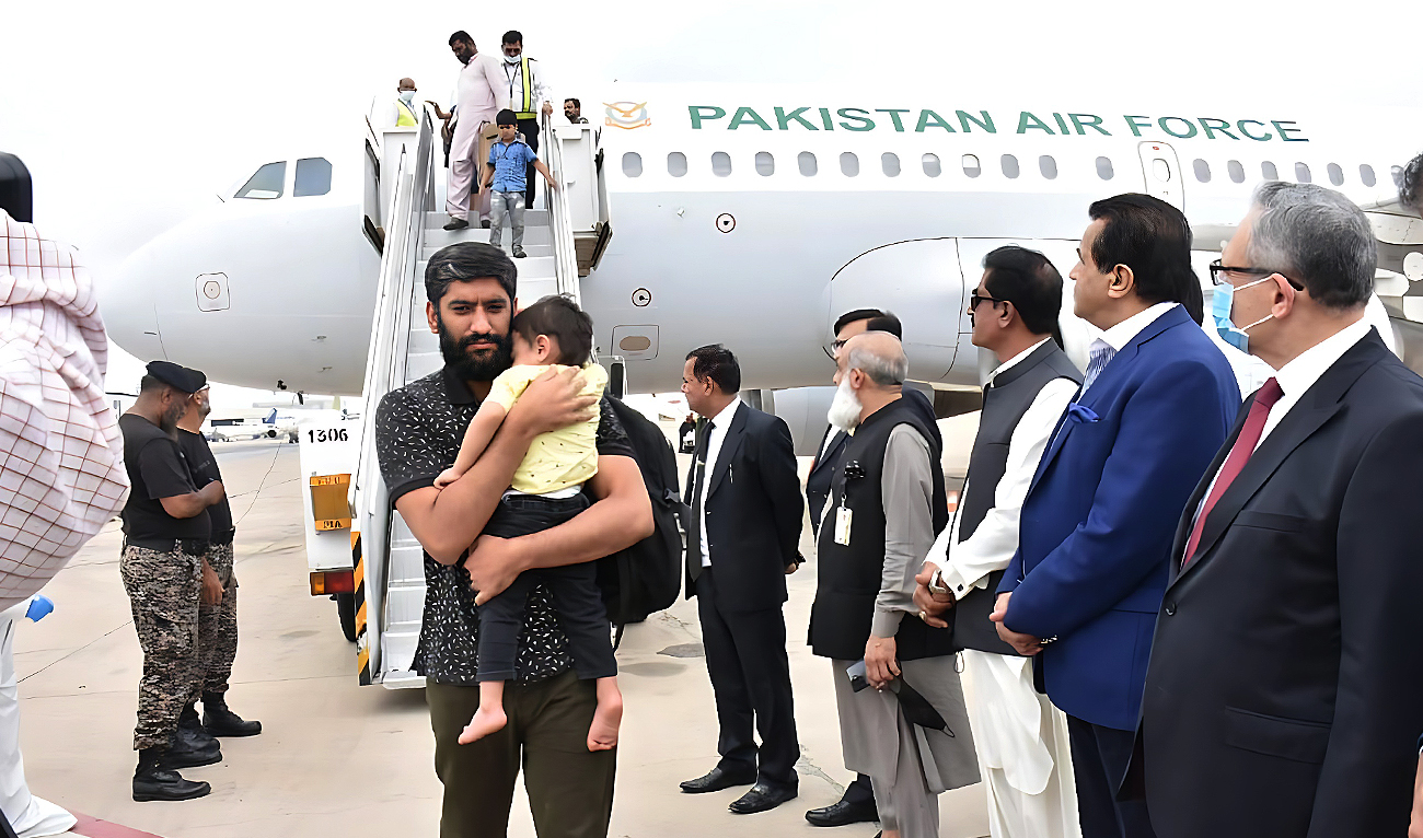 This picture shows the first group of Pakistani nationals evacuated from strife-torn Sudan arriving at Jinnah International Airport in Karachi on April 28, 2023. (Photo courtesy: Press Information Department)