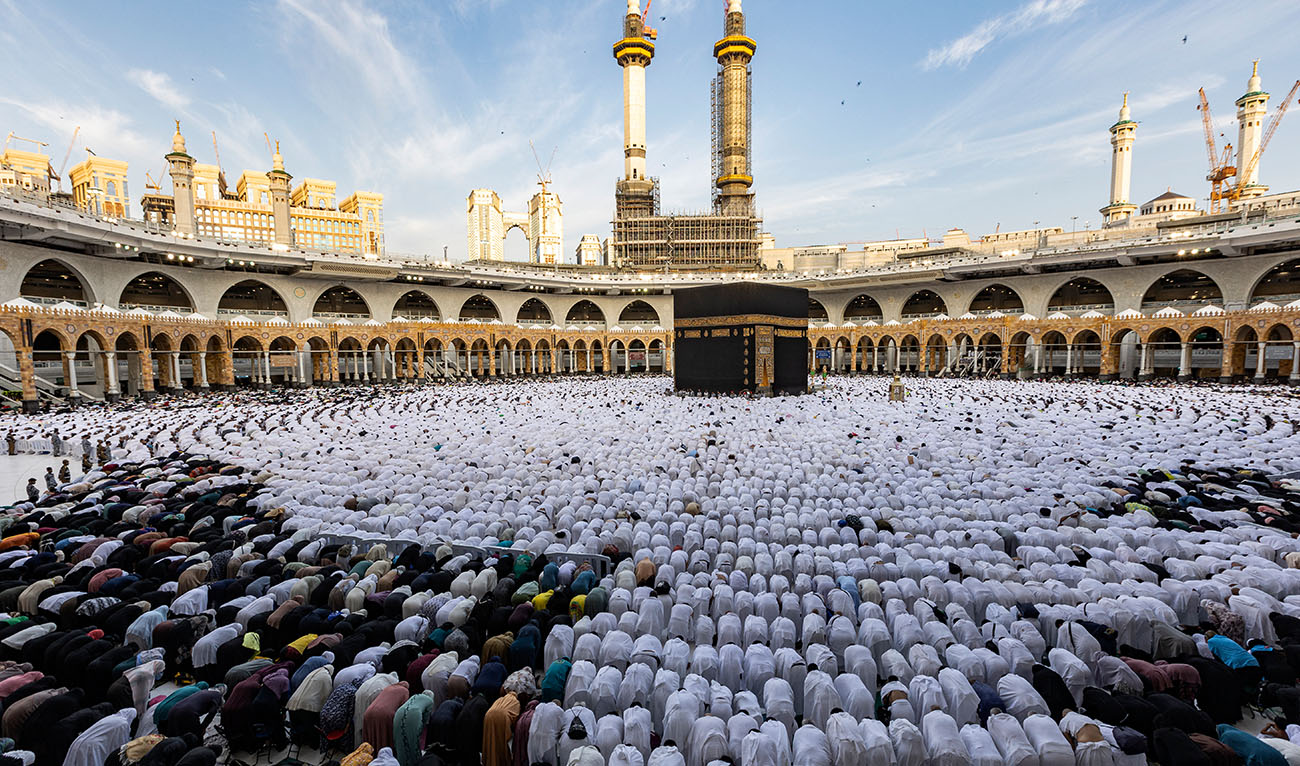 Muslim worshippers pray around the Kaaba, Islam's holiest shrine, at the Grand Mosque in the holy city of Mecca on the first day of Eid al-Fitr, which marks the end of the holy fasting month of Ramadan on April 21, 2023. (AFP/File)