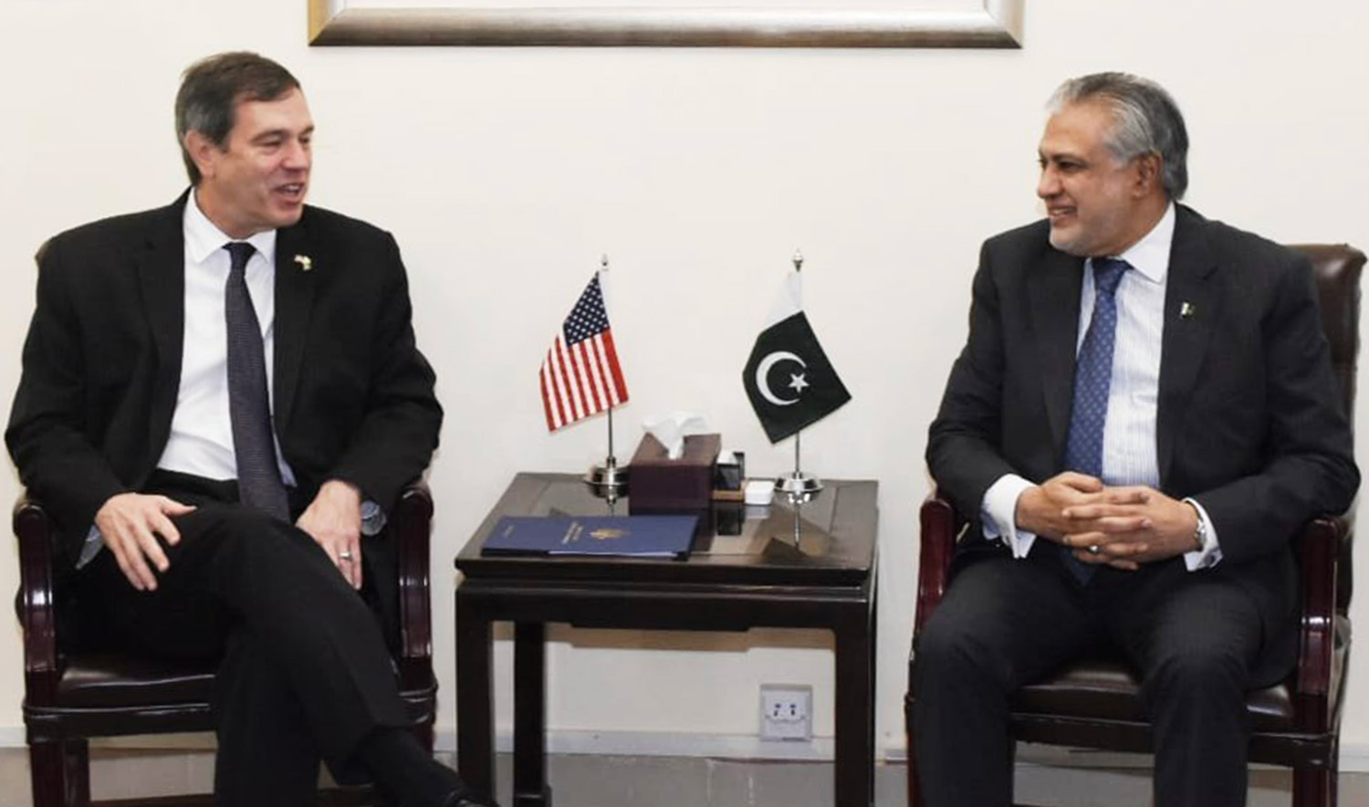 Pakistan's Finance Minister Ishaq Dar, right, meets with US embassy Charge d'affaires Andrew Schofer in Islamabad on May 3, 2023. (Photo courtesy: @FinMinistryPak/Twitter)