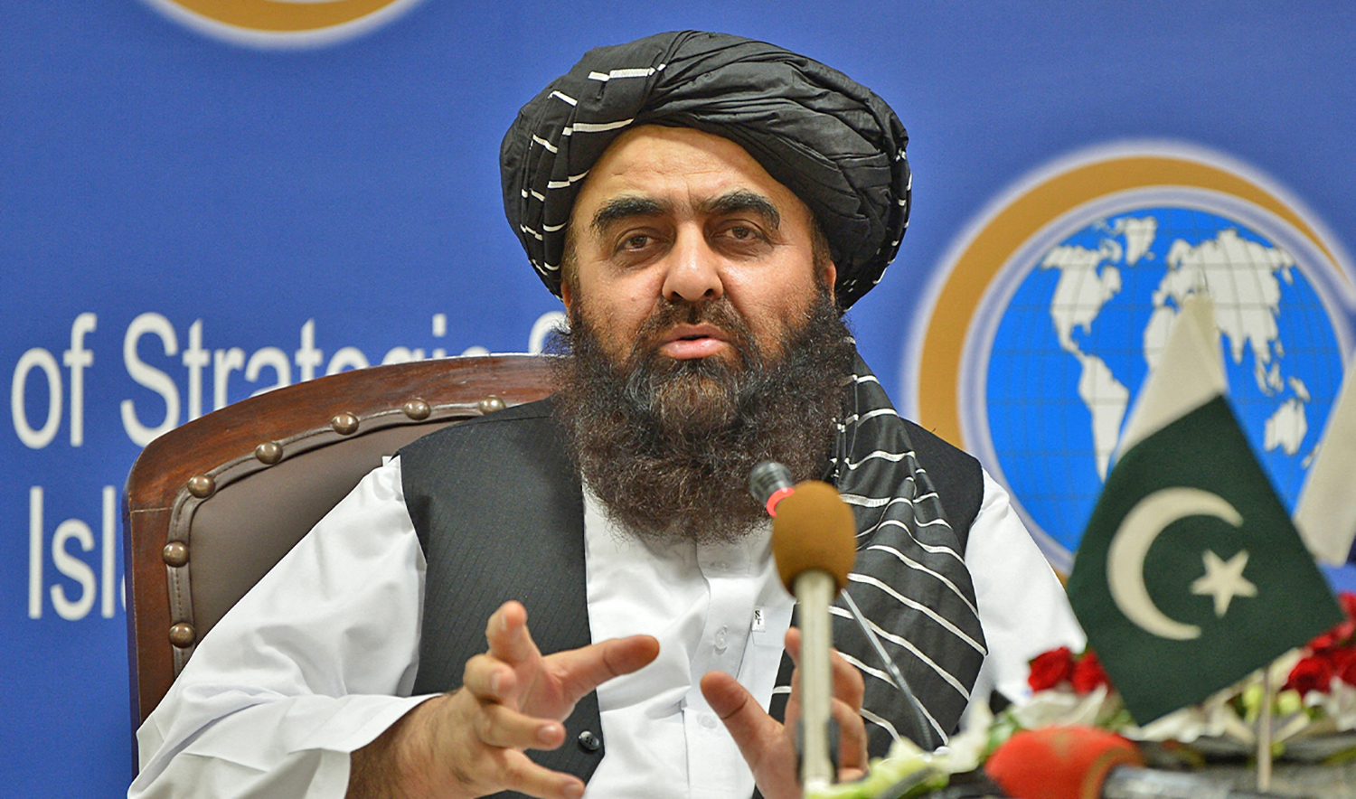 Afghanistan's acting Foreign Minister Amir Khan Muttaqi gestures while speaking during an event held in the Institute of Strategic Studies in Islamabad, Pakistan, on November 12, 2021. (AFP/File)