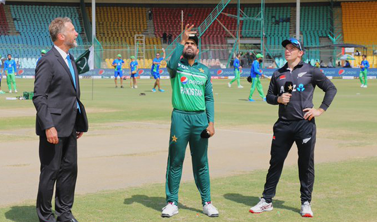 Pakistani skipper Babar Azam (center) flips the coin during the toss before the fourth one-day international match against New Zealand in Karachi, Pakistan on May 5, 2023. (Photo courtesy: @TheRealPCB/Twitter)