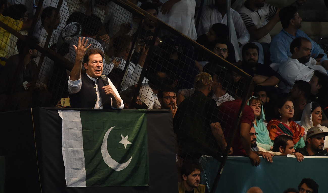 Pakistan's former Prime Minister and Pakistan Tehreek-e-Insaf party (PTI) chief Imran Khan, delivers a speech to his supporters during a rally to celebrate the 75th anniversary of Pakistan's independence day in Lahore on August 13, 2022. (AFP/File)