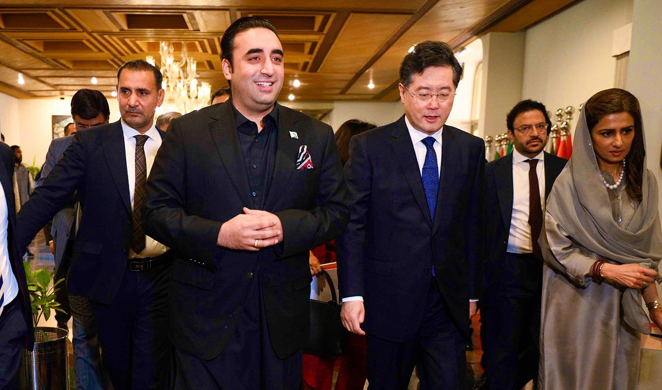 In this handout picture, taken and released by the Ministry of Foreign Affairs of Pakistan, Foreign Minister Bilawal Bhutto-Zardari (left) welcomes his Chinese counterpart Qin Gang ( second right) with the Minister of States for Foreign Affairs Hina Rabbani Khar (right) at the Foreign Office in Islamabad on May 6, 2023. (Photo courtesy: MOFA)