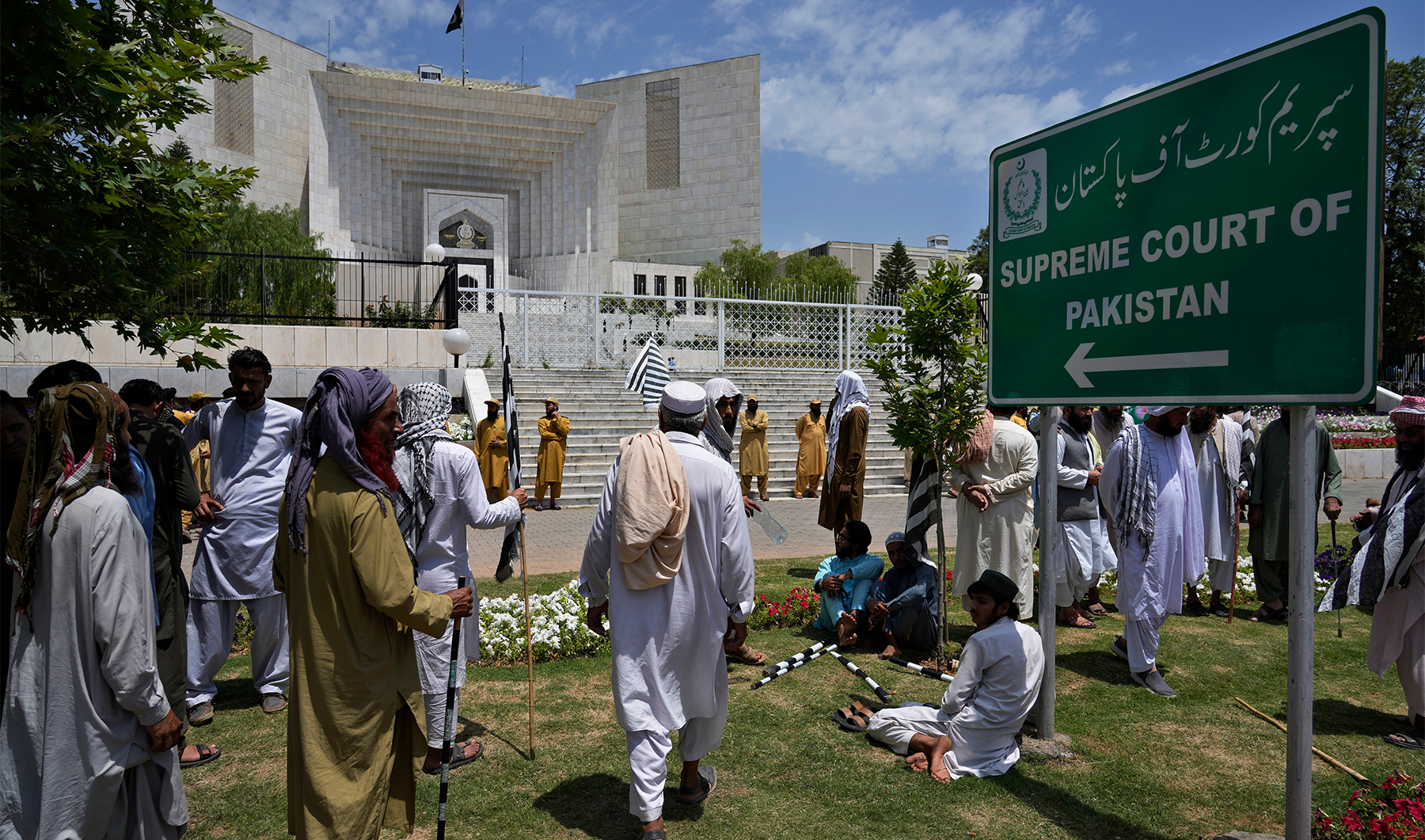 Supporters of Pakistan Democratic Movement, an alliance of the ruling political parties, gather to attend a rally outside the Supreme Court in Islamabad, Pakistan, on May 15, 2023. (AP)