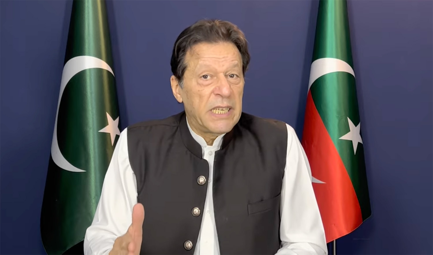 Former Pakistan Prime Minister Imran Khan speaks to his supporters from his Lahore's Zaman Park residence through video link on May 17, 2023. (Photo courtesy: Pakistan Tehreek-e-Insaf)