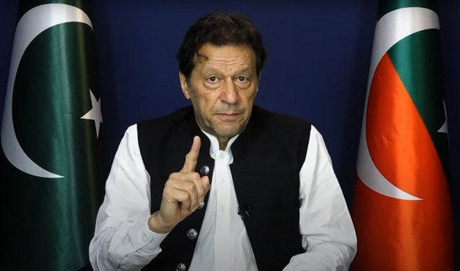 In this screengrab taken from Pakistan Tehreek-e-Insaf political party's live YouTube feed, Pakistan's former prime minister Imran Khan gestures during his speech in Lahore on May 13, 2023, a day after he was released on bail from Islamabad High Court in an anti-graft case. (AN Photo)