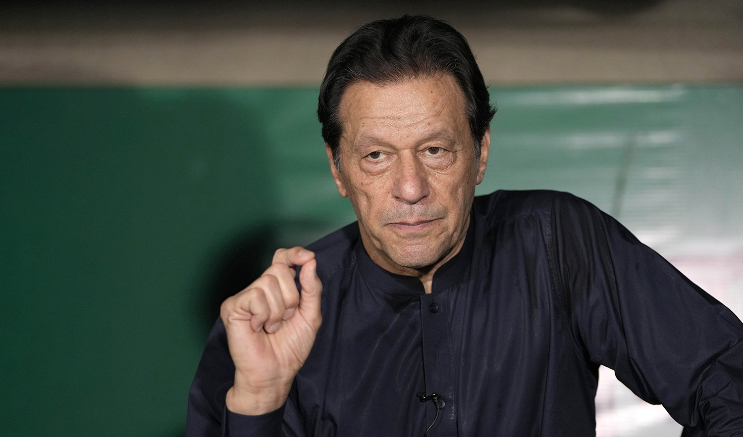 Pakistan's former Prime Minister Imran Khan speaks during a press conference at his home, in Lahore, Pakistan, on May 18, 2023. (AP)