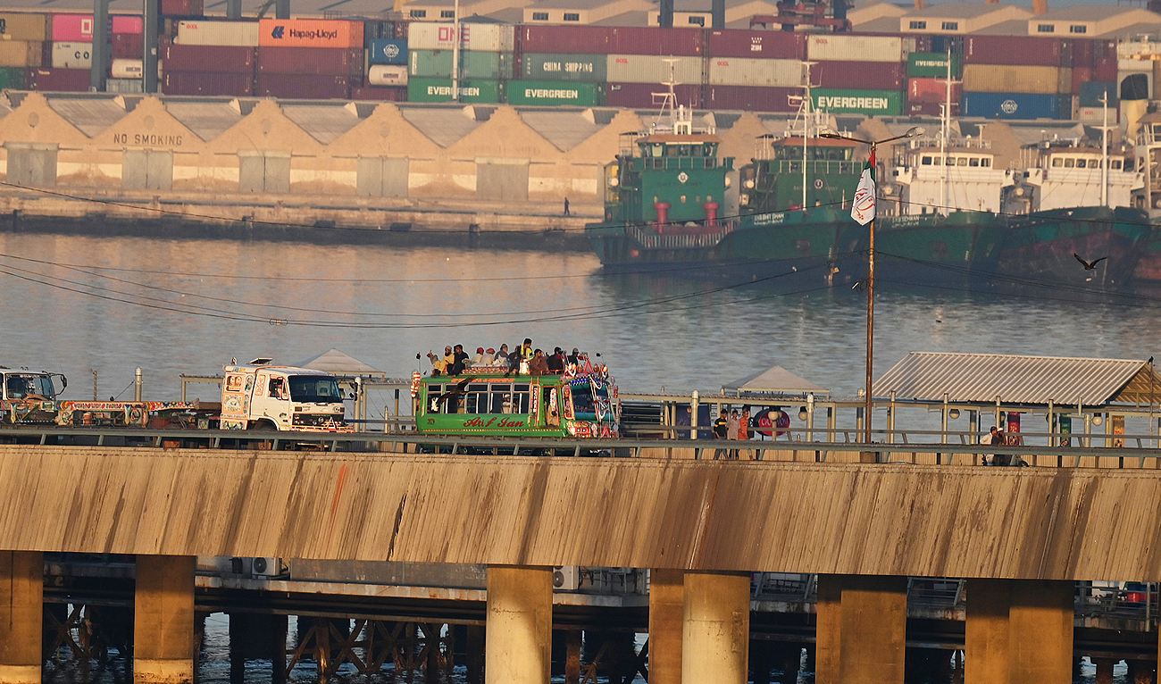 In this file picture, taken on April 6, 2023, people travel on an overcrowded passenger bus near a seaport in Karachi. (Photo courtesy: AFP/File)
