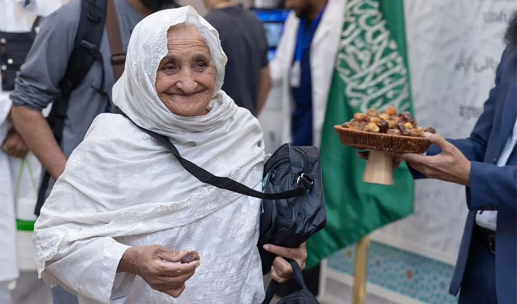 A Pakistani pilgrim is pictured as she arrives at Prince Mohammad bin Abdulaziz International Airport in Madinah, Saudi Arabia, for Hajj on May 22, 2023. (SPA)
