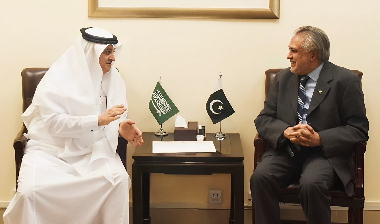 Saudi Arabia's Ambassador Nawaf bin Said Al-Malki, left, and Pakistan's finance minister Ishaq Dar during their meeting in Islamabad on May 22, 2023. (Photo courtesy: @FinMinistryPak/Twitter)