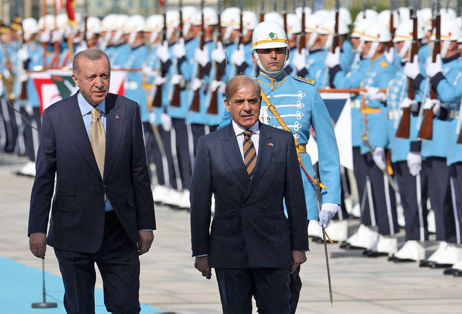 In this file picture, taken on June 1, 2022, Turkish President Recep Tayyip Erdogan (L) walks with Prime Minister of Pakistan Shehbaz Sharif upon his arrival during an official ceremony at the Presidential Complex in Ankara, Turkiye. (Photo courtesy: AFP/File)