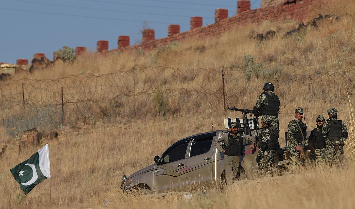 In this file photo, taken on January 27, 2019, Pakistani army soldiers gather near a vehicle at a border terminal in Ghulam Khan, a town in North Waziristan, on the border between Pakistan and Afghanistan. (Photo courtesy: AFP/File)