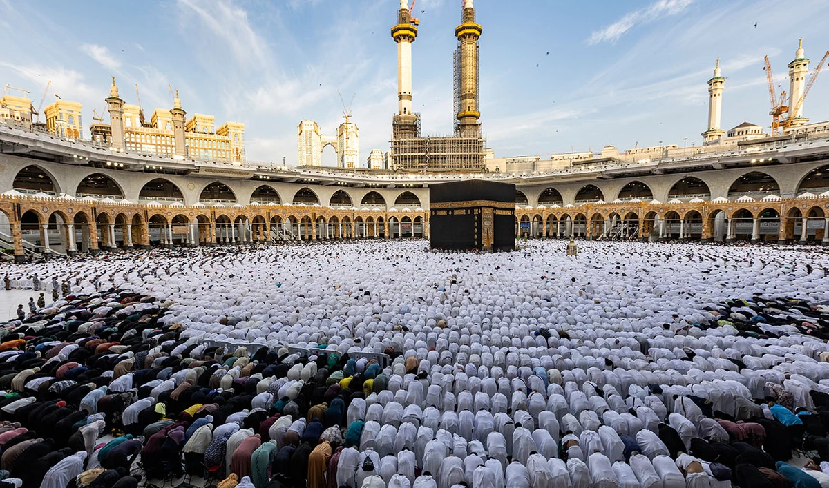 Muslim worshippers pray around the Kaaba, Islam's holiest shrine, at the Grand Mosque in the holy city of Mecca on the first day of Eid al-Fitr, which marks the end of the holy fasting month of Ramadan on April 21, 2023. (AFP/File)