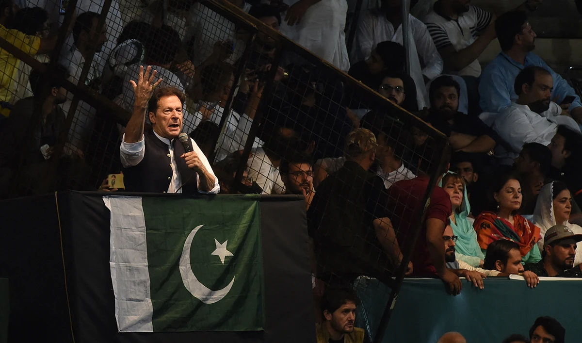 Pakistan's former Prime Minister and Pakistan Tehreek-e-Insaf party (PTI) chief Imran Khan, delivers a speech to his supporters during a rally to celebrate the 75th anniversary of Pakistan's independence day in Lahore on August 13, 2022. (AFP/File)