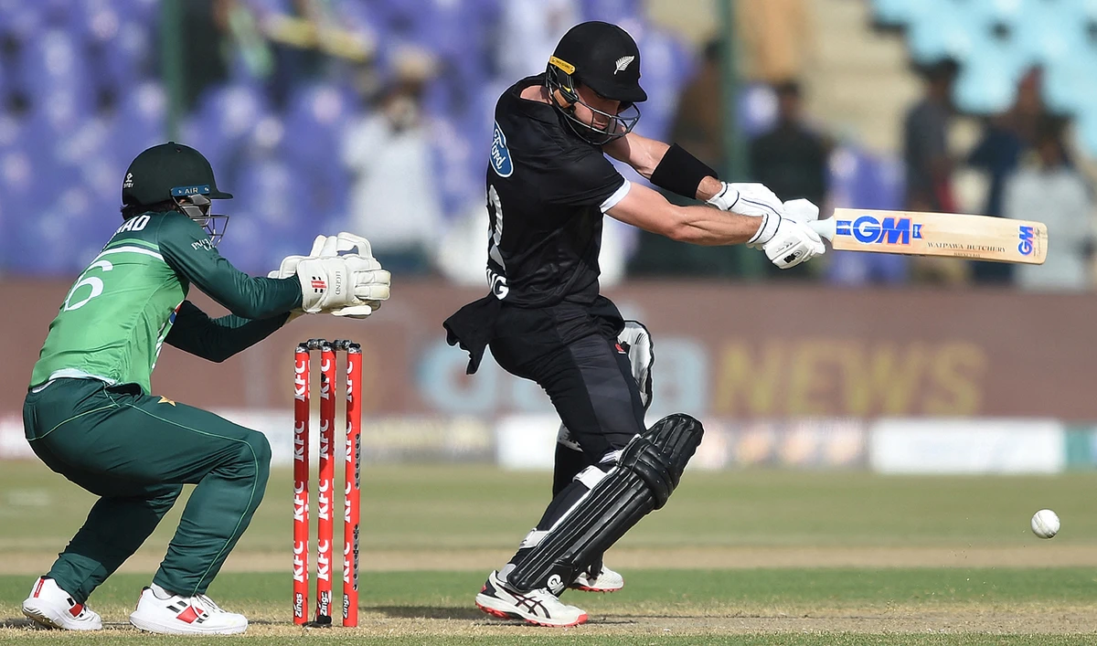 New Zealand's Will Young (R) plays a shot during the fifth and final One-Day International (ODI) cricket match between Pakistan and New Zealand at the National Stadium in Karachi on May 7, 2023. (Photo courtesy: AFP)
