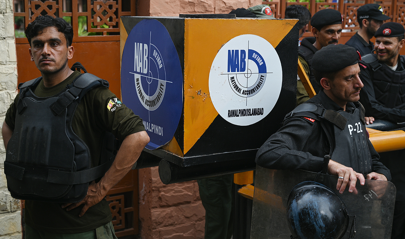 Pakistan's frontier constabulary personnel stand guard at the entrance of National Accountability Bureau (NAB) court, during the case hearing of former Pakistan's prime minister Imran Khan, in Islamabad on May 23, 2023. (Photo courtesy: AFP/File)