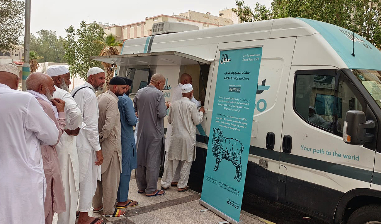 Pakistani pilgrims purchase tokens for animal sacrifice in Makkah, Saudi Arabia, on June 11, 2023, ahead of annual Islamic Hajj pilgrimage which will take place later this month. (Photo courtesy: Pakistani Hajj Mission)