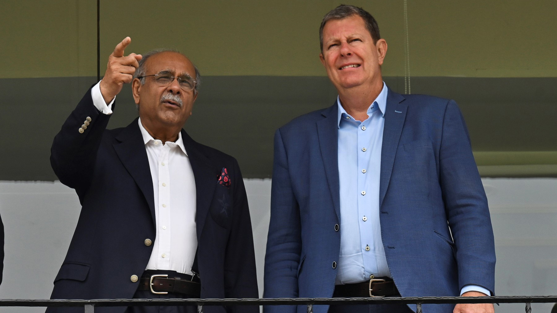 International Cricket Council (ICC) Chairman Greg Barclay (R) visits the Gaddafi Stadium along with Pakistan Cricket Board Chairman (PCB) Najam Sethi (L) in Lahore on May 30, 2023. (AFP/File)